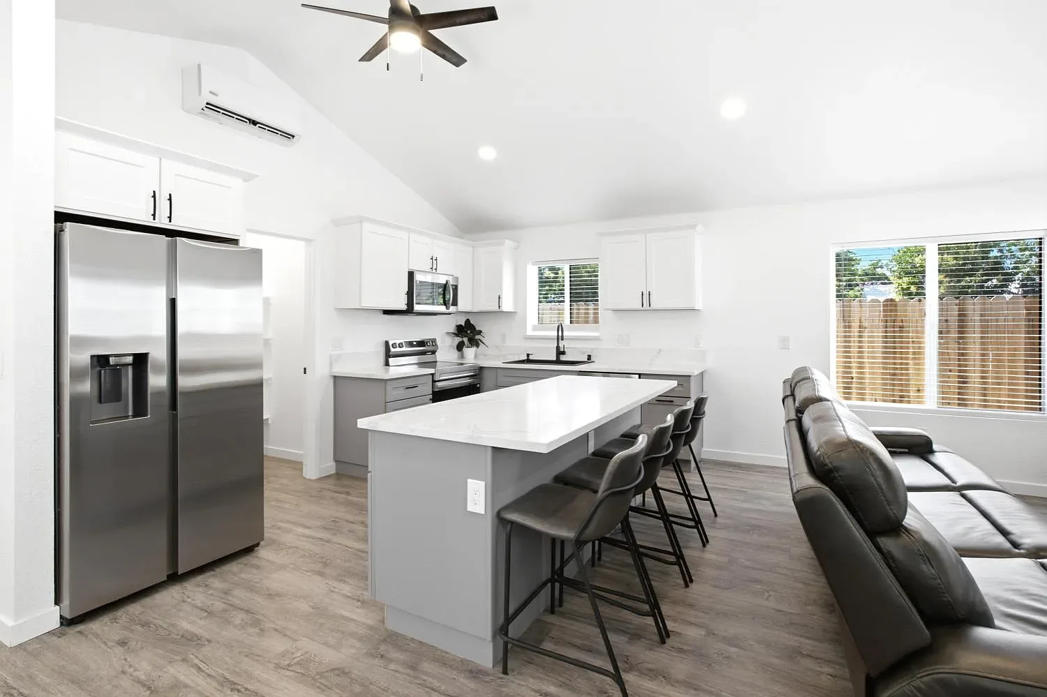 Inside the new back unit, with its vaulted ceiling and open kitchen.